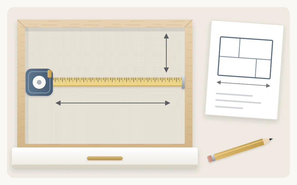 An empty open drawer with a tape measure laid across its inside width beside a sheet of paper with a rectangle sketch and a pencil