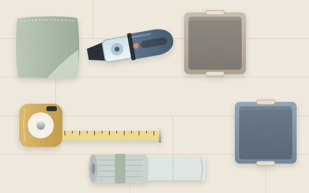 A soft cloth, a small handheld vacuum, a tape measure, a roll of bags and two empty fabric bins on a pale floor
