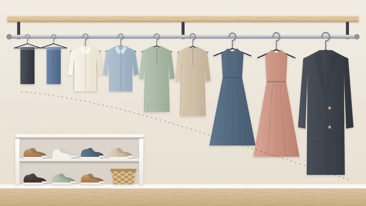 A long closet rod with garments arranged from short to long on matching slim hangers with even gaps